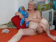 Granny with hairy pussy Agnes plays with her pink wet vagina