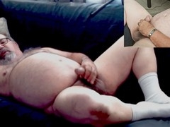 Old bear man getting off in his socks