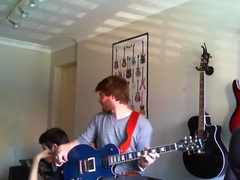 Sexy hunk plays guitar and strips- then mum walks in!!