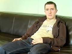 Inexperienced Brit oils up his cock and shoots his load after interview