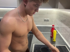 Sexy towheaded teddy bear cooks up a spicy dish in the nude