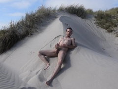 Masturbate and spunk in the dunes