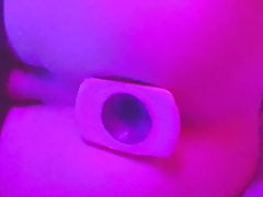 Close-up smooth pink twink butt plug play
