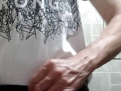 A handjob in the bathroom