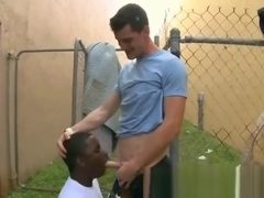 Young black guy sucks a delicious white cock
