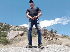 Wetting my jeans next to a public sculpture