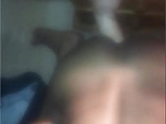 Black twink rides dildo while sucking a dick