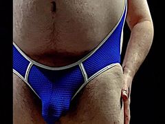 Big Belly Coach tries on singlet