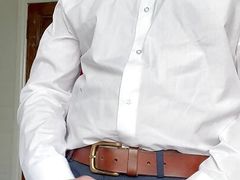 Wank and cumshot in buttoned up white shirt.