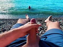 Skinny twinky sucked the big of a stranger jerking off to him on a public beach