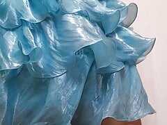 Crossdresser wearing cute satin ruffle party dress