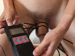 Olympic athlete instructing his man rod at maximum tens unit.