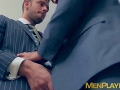 Businessmen in suits indulge in a steamy elevator orgy
