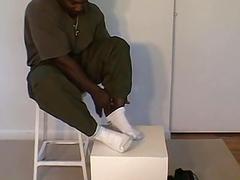 Chocolate god has his feet licked