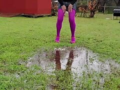 CD wet play in pantyhose  humping a large backyard puddle.