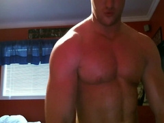 Hot young muscle hunk shows off his pecs