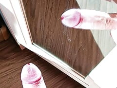 Cumming on a mirror on a sunny day POV