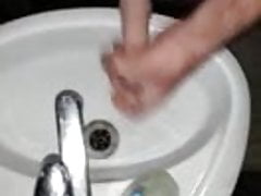 Jerking in the bathroom
