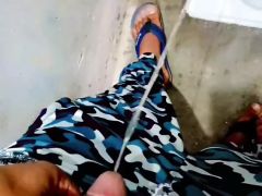 Desi teen indian boy peeing in public toilet