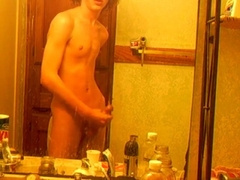 Curly-haired youngster in douche