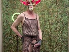 Masturbating alone in fishnet stockings and cock ring
