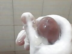Nice foam massage with cumshot in bath