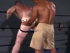 Dakota Phillips wrestles his latin boy
