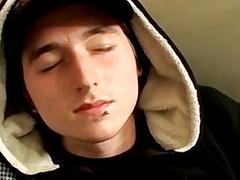 Dashing twink in a hoodie tugs on his big cock