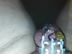 My cock locked away in chastity.