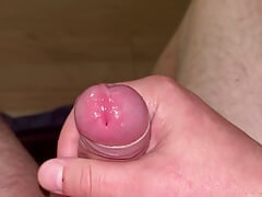 Cock cums close up