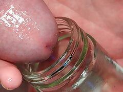 Moaning and messy cumshot while Rising on my fake cock and balls while wanking and edging cum into a glass jar