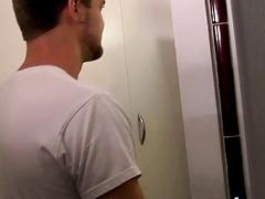 Jock rides a big dildo in the shower and masturbates