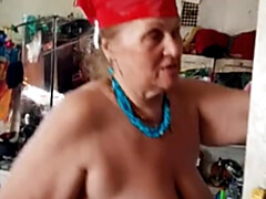 Lustful Russian granny gets nude and blows a cock