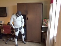 Wet and wild wetsuit action in a motel room