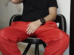 Latino shows the soles of his feet in pantyhose
