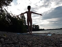 Slender nudist boy does yoga nude on a naturist beach. Naked yoga video by Jon Arteen gay porn model  Skinny naturist twink prac