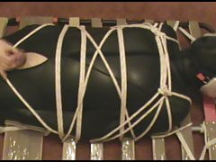 Slave in a full neoprene