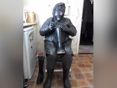 Dark rubber NBC costume jack off.