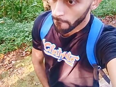Big uncut cock latino jerking outdoors in the woods and eating his tasty cum careful not to get caught