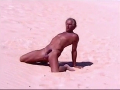 Tanned guy on beach in tiny string thong (temporarily!)