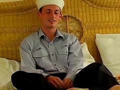 Navy twink strips his uniform and strokes his hard cock