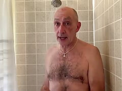 Daoud takes a shower and shaves his face