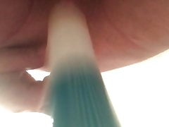 Lube bottle in arse with no panties on