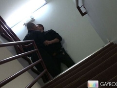Public stairwell handjob with a hot gay duo making out