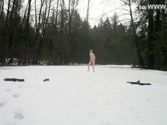 strips and remains naked in the snow