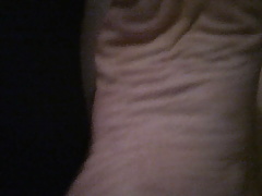 Taking Socks off and showing feet
