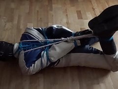 Bound in leather suit