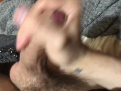 A young man wanks off his schlong with oil