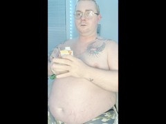 Chubby piggy gulps down drinks & shows off smooth belly