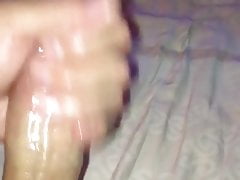 I caress the penis with oil and finish